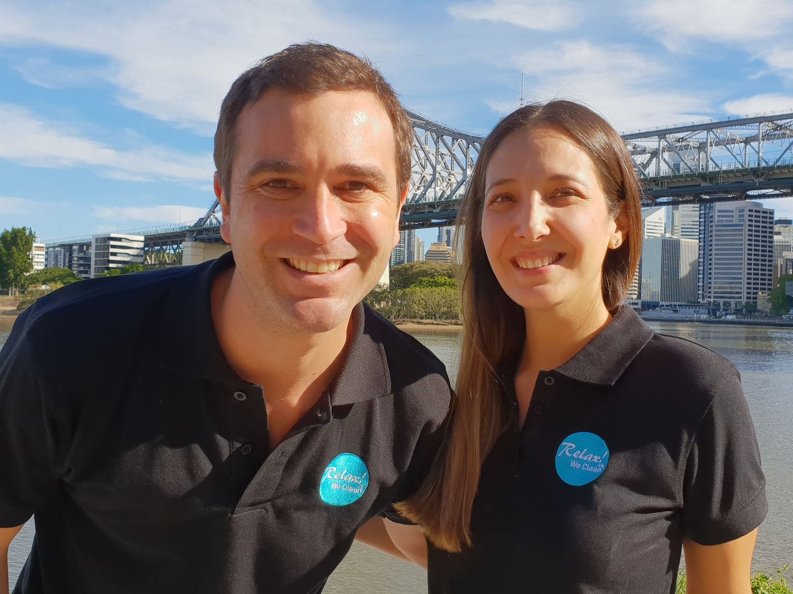Pablo and Caro, founders of Relax! We Clean, at the Story Bridge in Brisbane